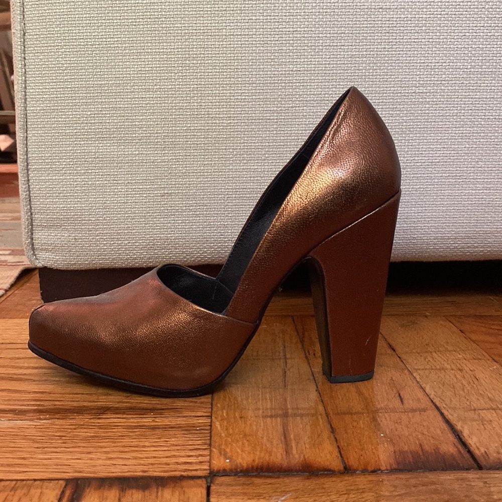 Rachel Comey muted gold platform heels.